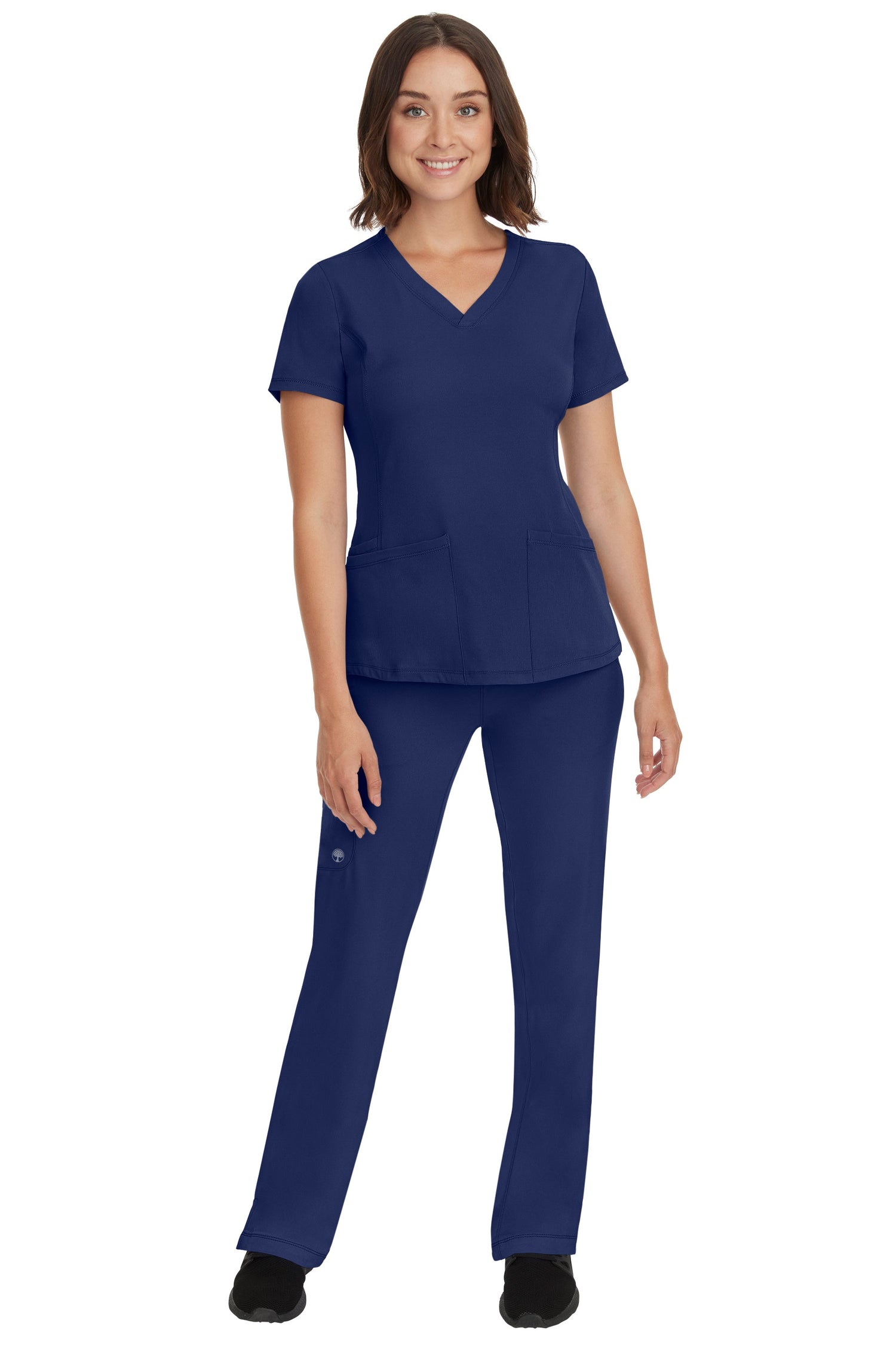 Female healthcare professional wearing navy blue women’s scrub set – comfortable medical uniform by Omscrub.